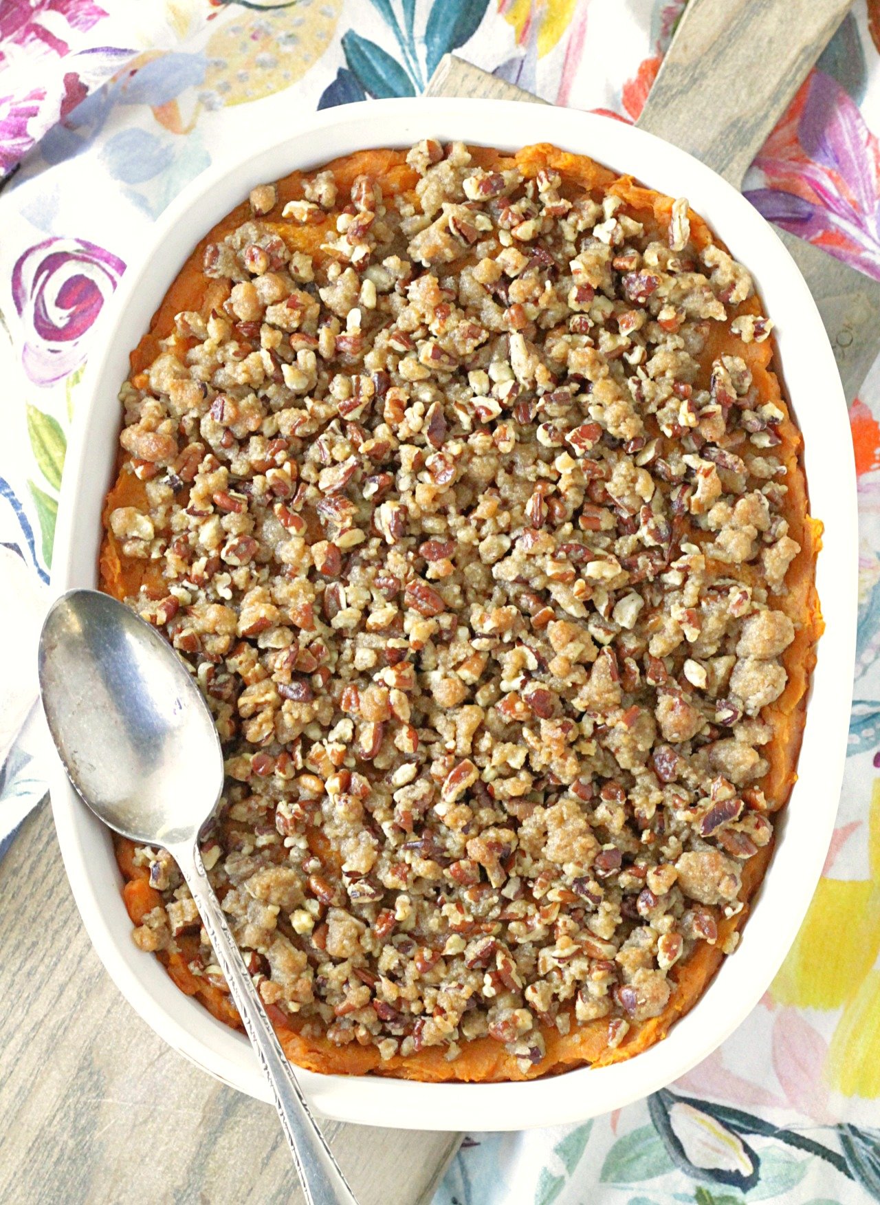 sweet potato pumpkin casserole in dish with spoon