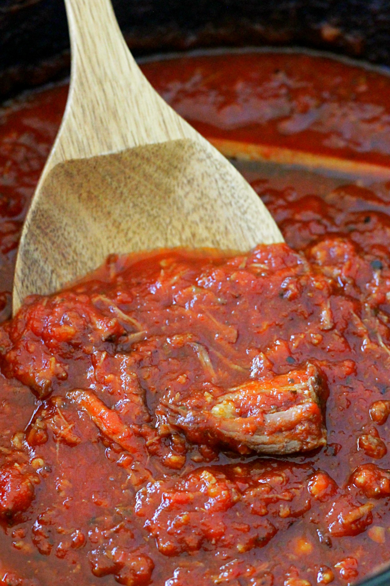 slow cooker short rib sunday gravy in slow cooker close up