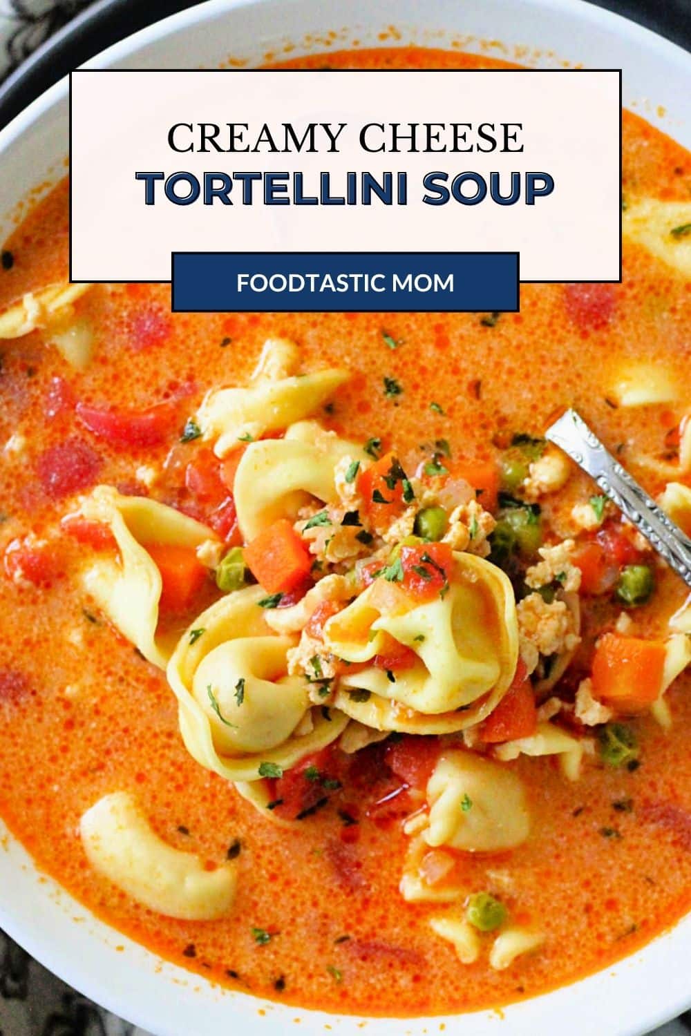 Creamy Cheese Tortellini Soup is filled with vegetables and ground turkey for a hearty and nutritious soup that kids love. via @foodtasticmom
