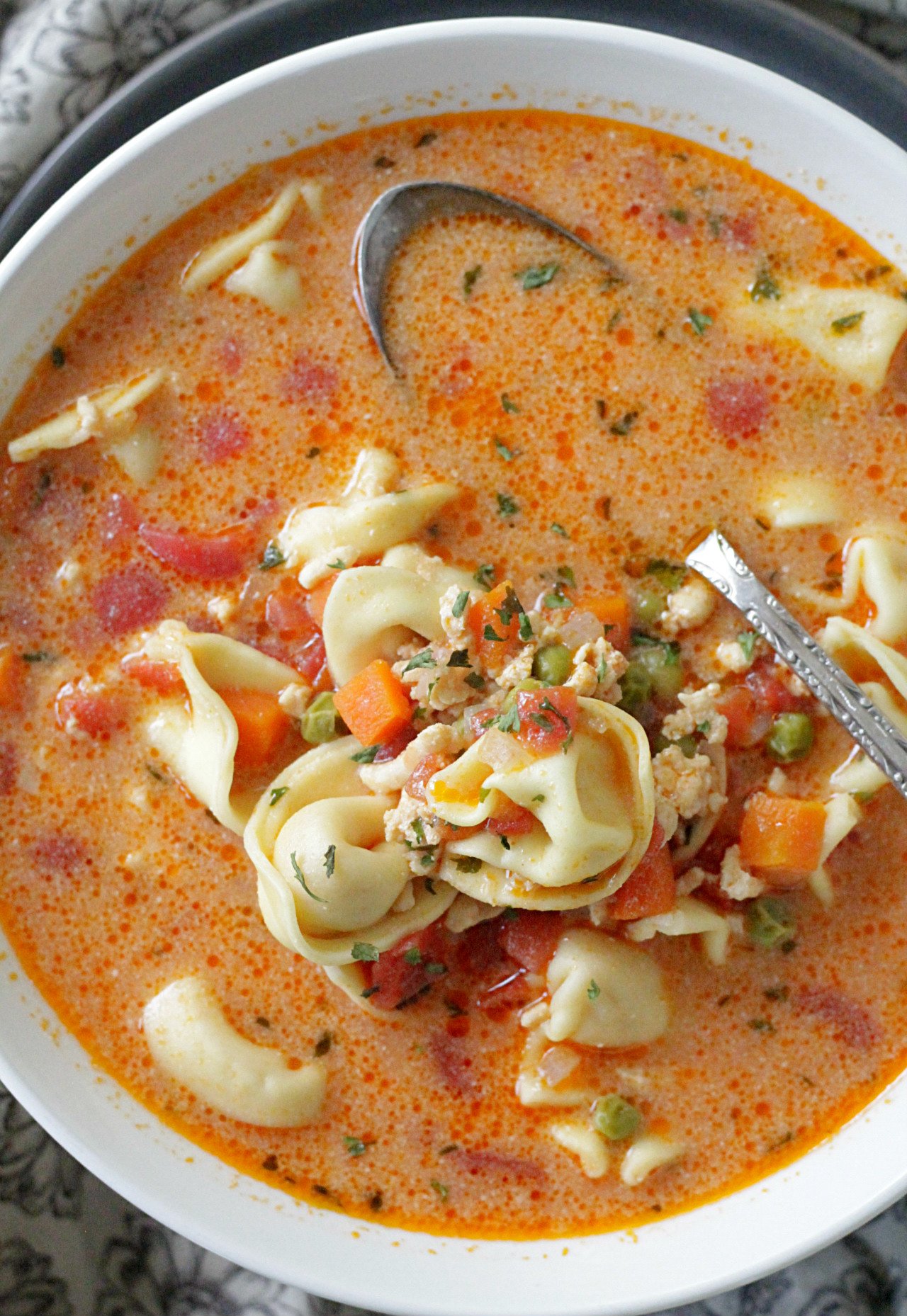 creamy cheese tortellini soup in bowl