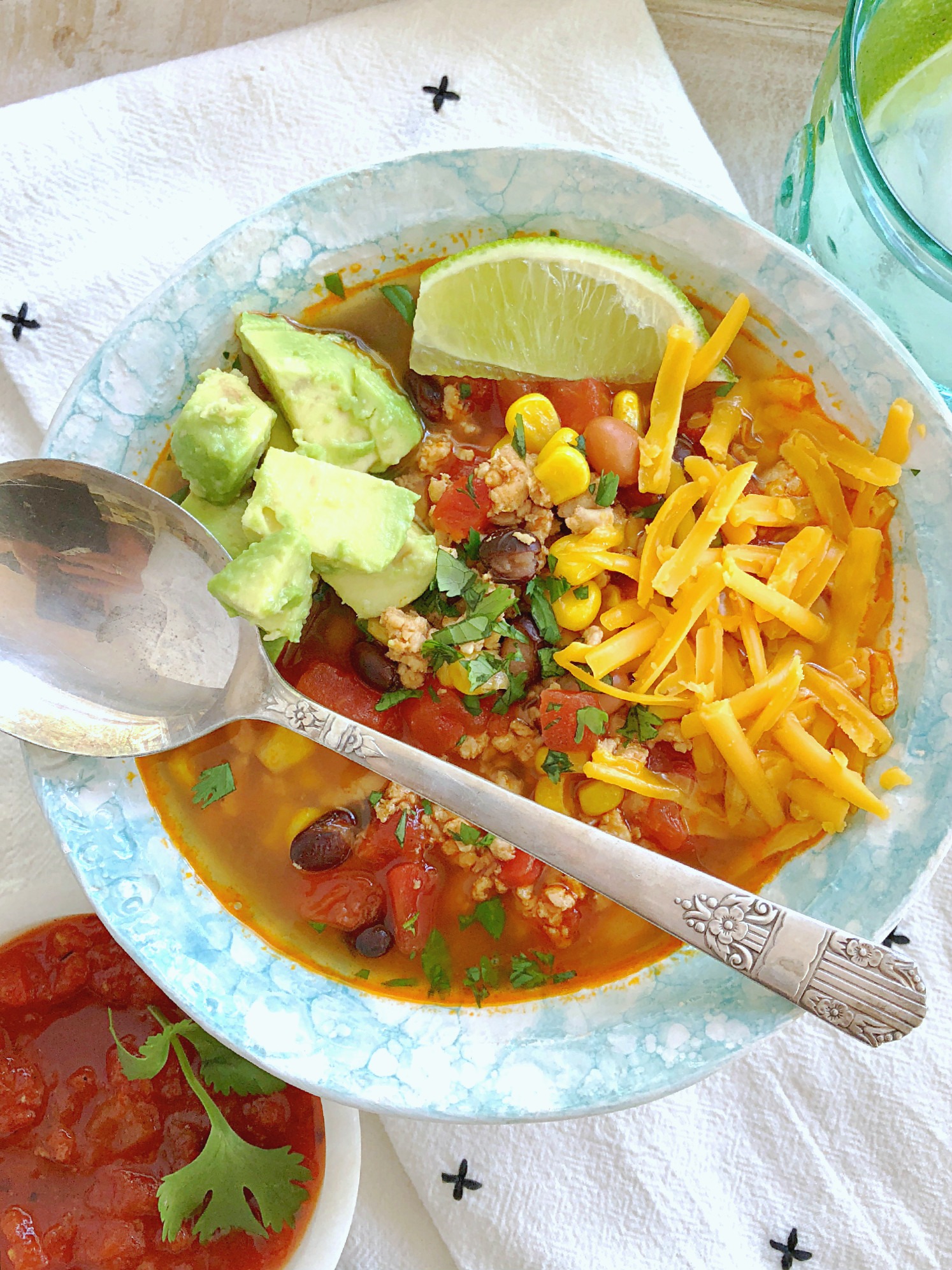 instant pot turkey taco soup in bowl with garnish