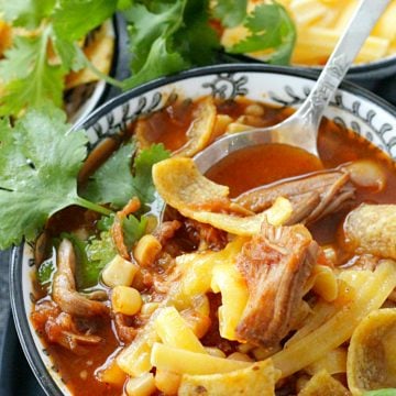 slow pulled pork chili in bowl with spoon