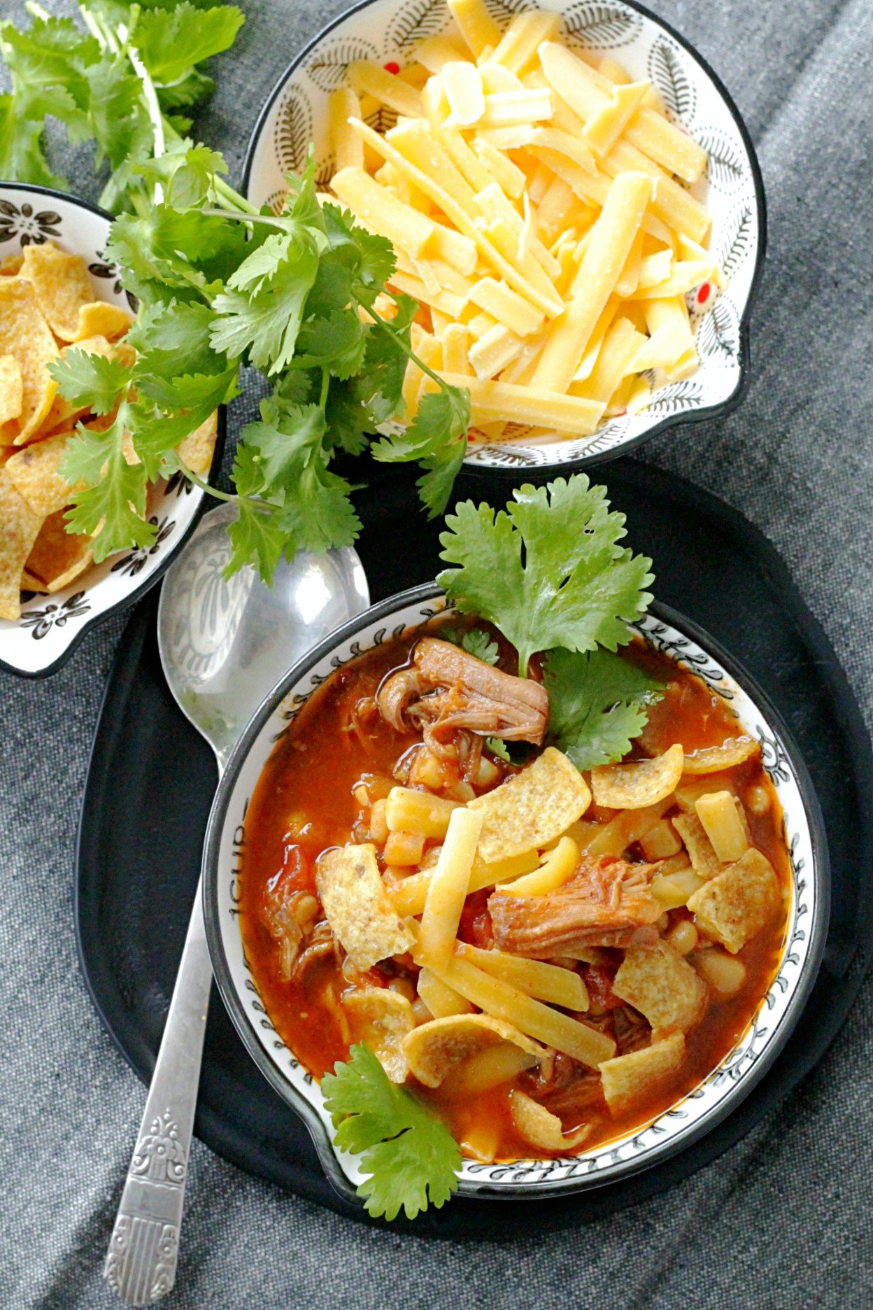 slow cooker pulled pork chili with cheese and fritos