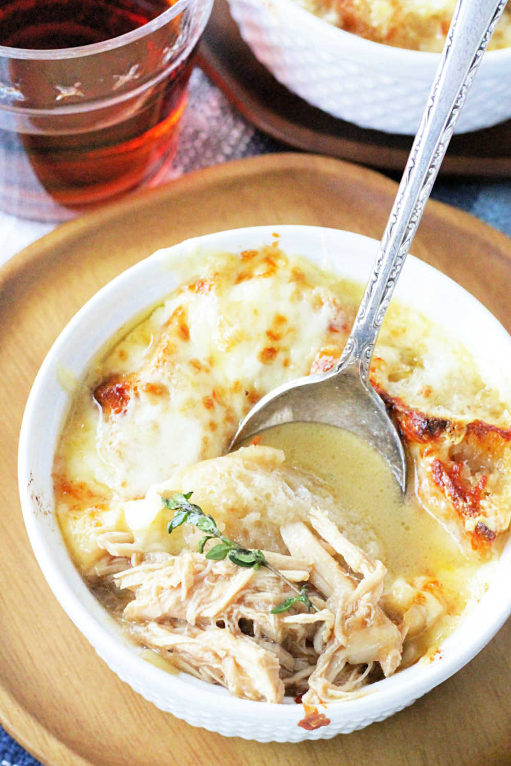 French Onion Chicken Soup adds chicken to make a main dish meal out of classic French Onion Soup. via @foodtasticmom