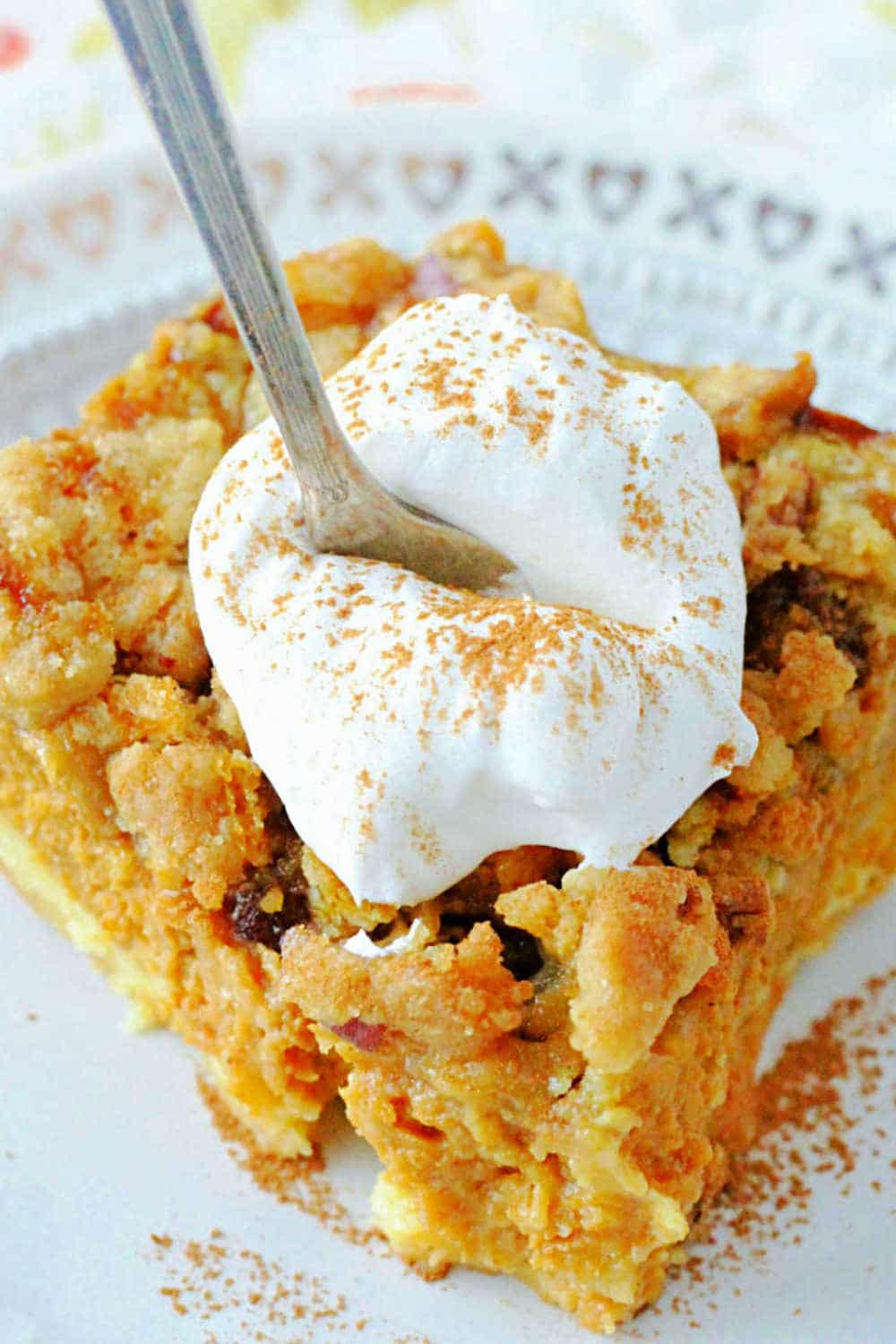 Pumpkin pie dump cake is a layered dessert. Tender yellow cake is topped with pumpkin pie filling and pecan streusel. via @foodtasticmom