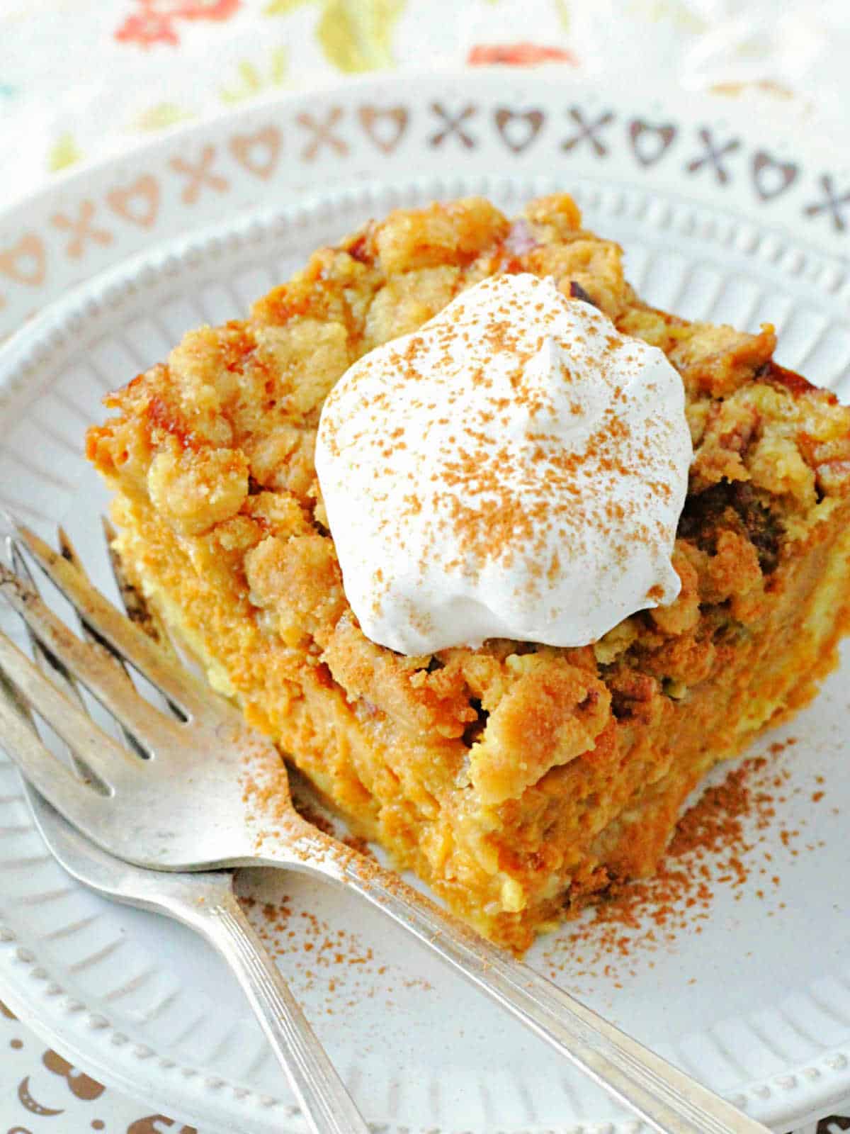plated slice of pumpkin pie dump cake