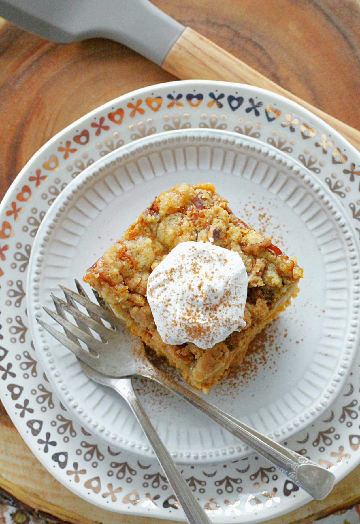 pumpkin pie dump cake on plate with forks