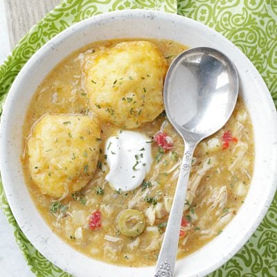 southwest chicken and dumplings in bowl with spoon