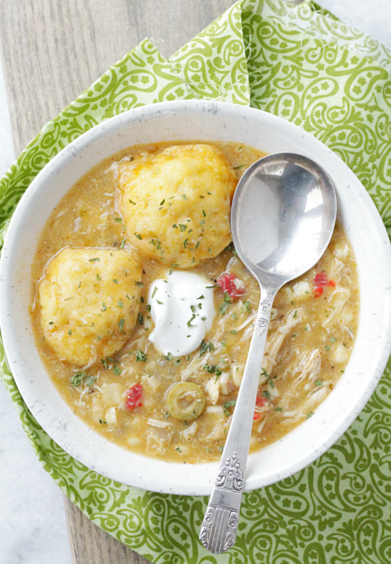 southwest chicken and dumplings in bowl with spoon