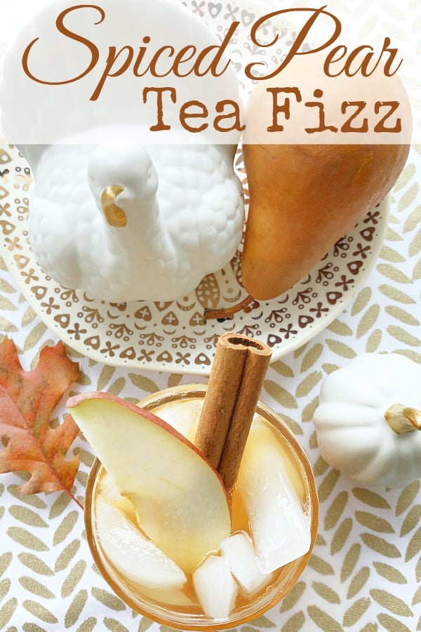 Spiced Pear Tea Fizz is a perfect non-alcoholic cocktail for the holidays, combining iced tea with a pear cinnamon simple syrup and ginger beer. via @foodtasticmom