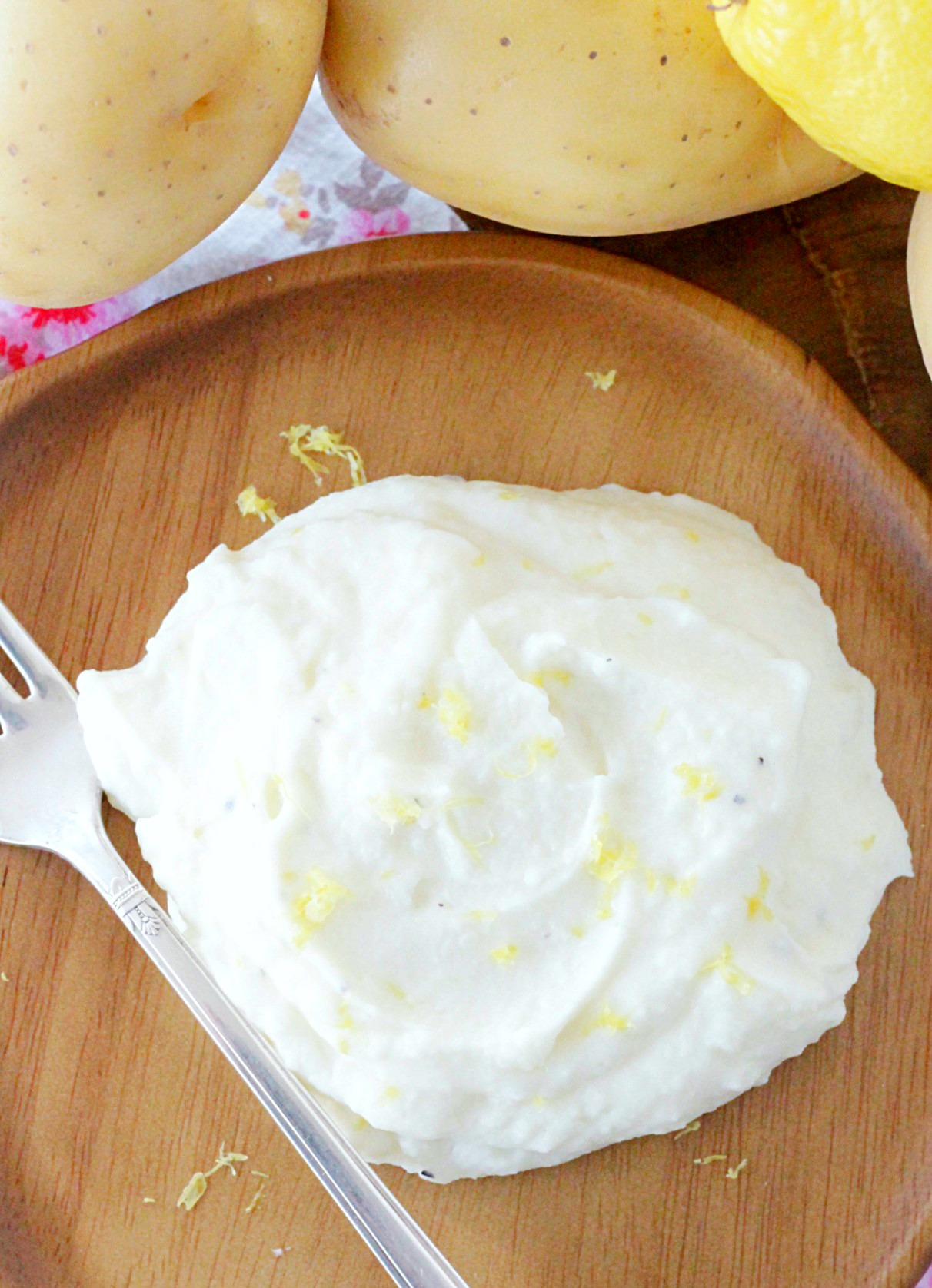 goat cheese lemon mashed potatoes on wooden plate with fork