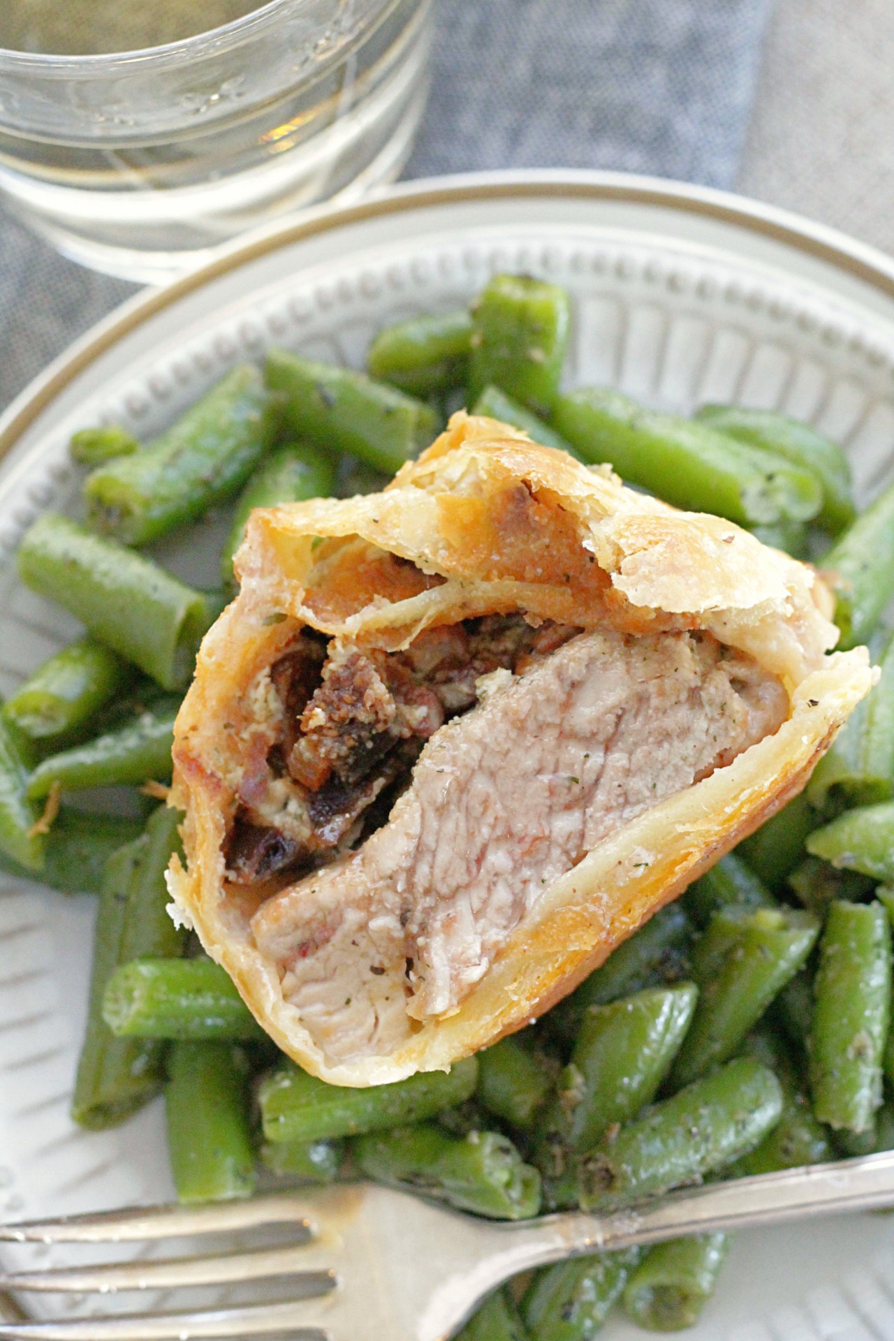 individual pork wellingtons recipe, wellington sliced in half