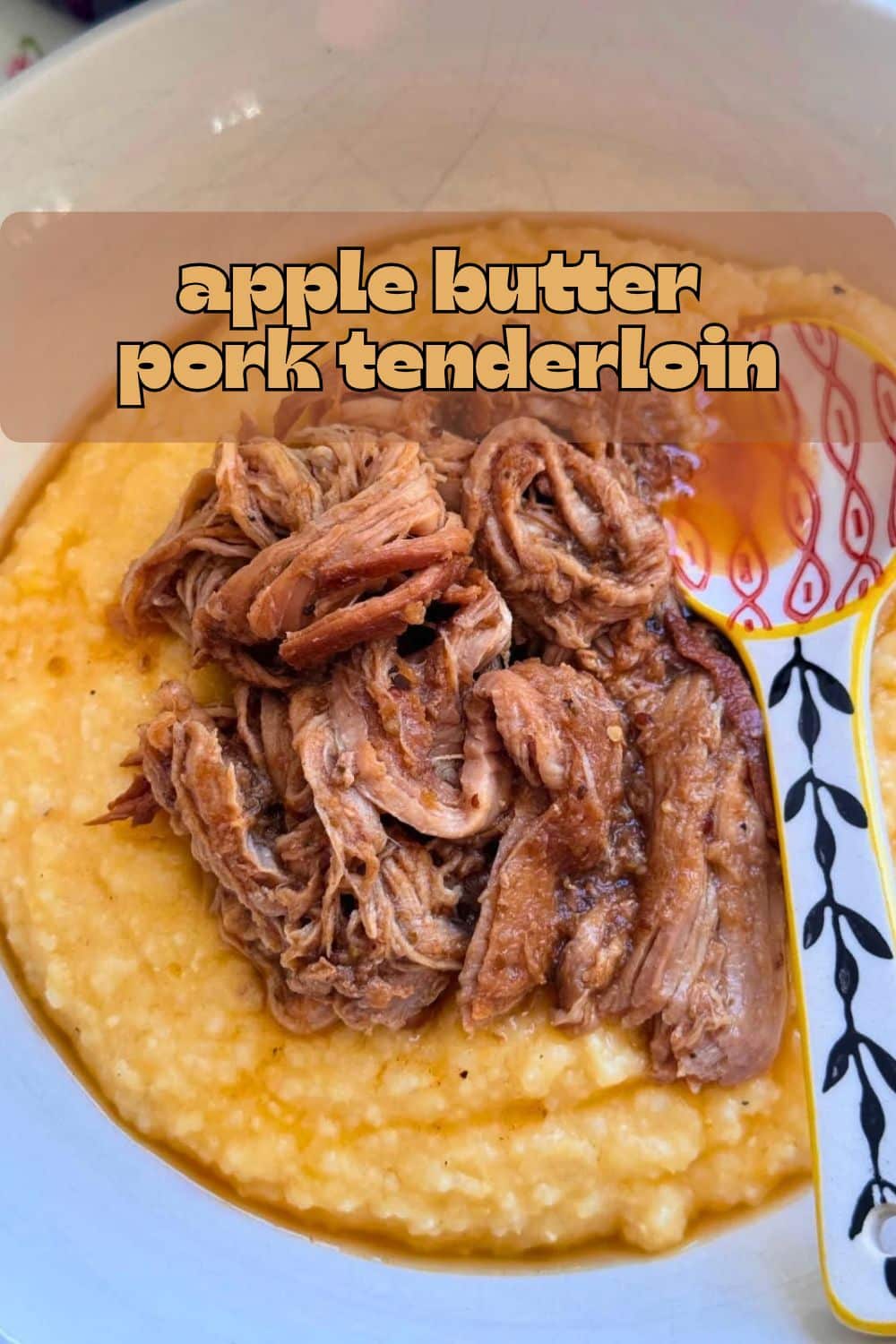 Slow cook pork tenderloin in seasoned apple butter for the most delicious, sweet and savory shredded pork. Perfect with baked cheese grits. via @foodtasticmom