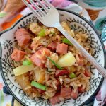 easy fried rice with ham and pineapple in bowl with fork