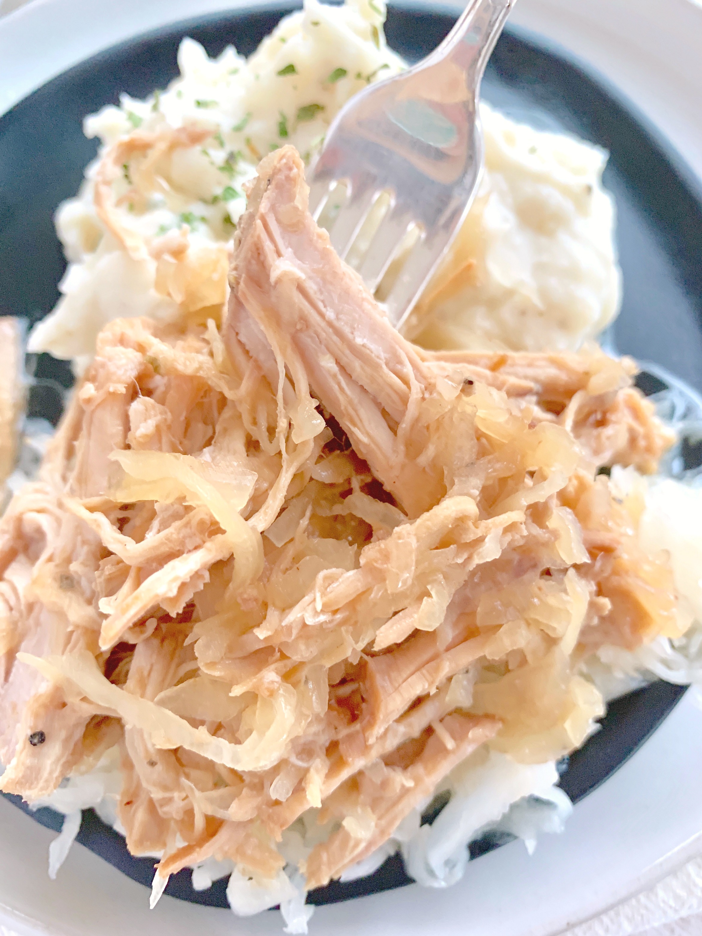 Slow Cooker Pork and Sauerkraut - Foodtastic Mom