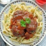 beef bourguinon meatballs on a plate of pasta