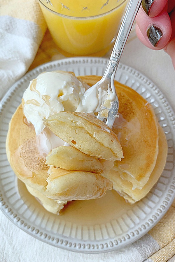 bite of the best buttermilk pancakes