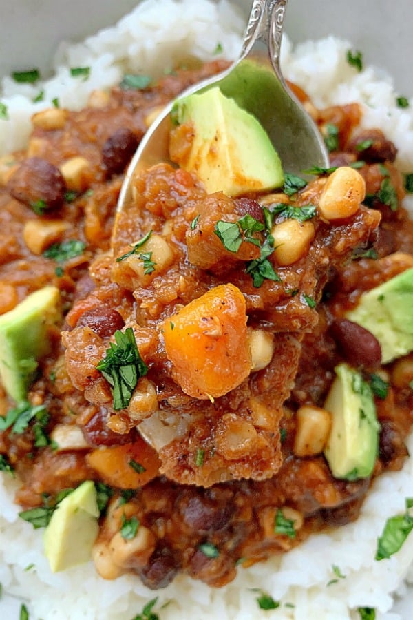 close up view vegetarian chili in spoon