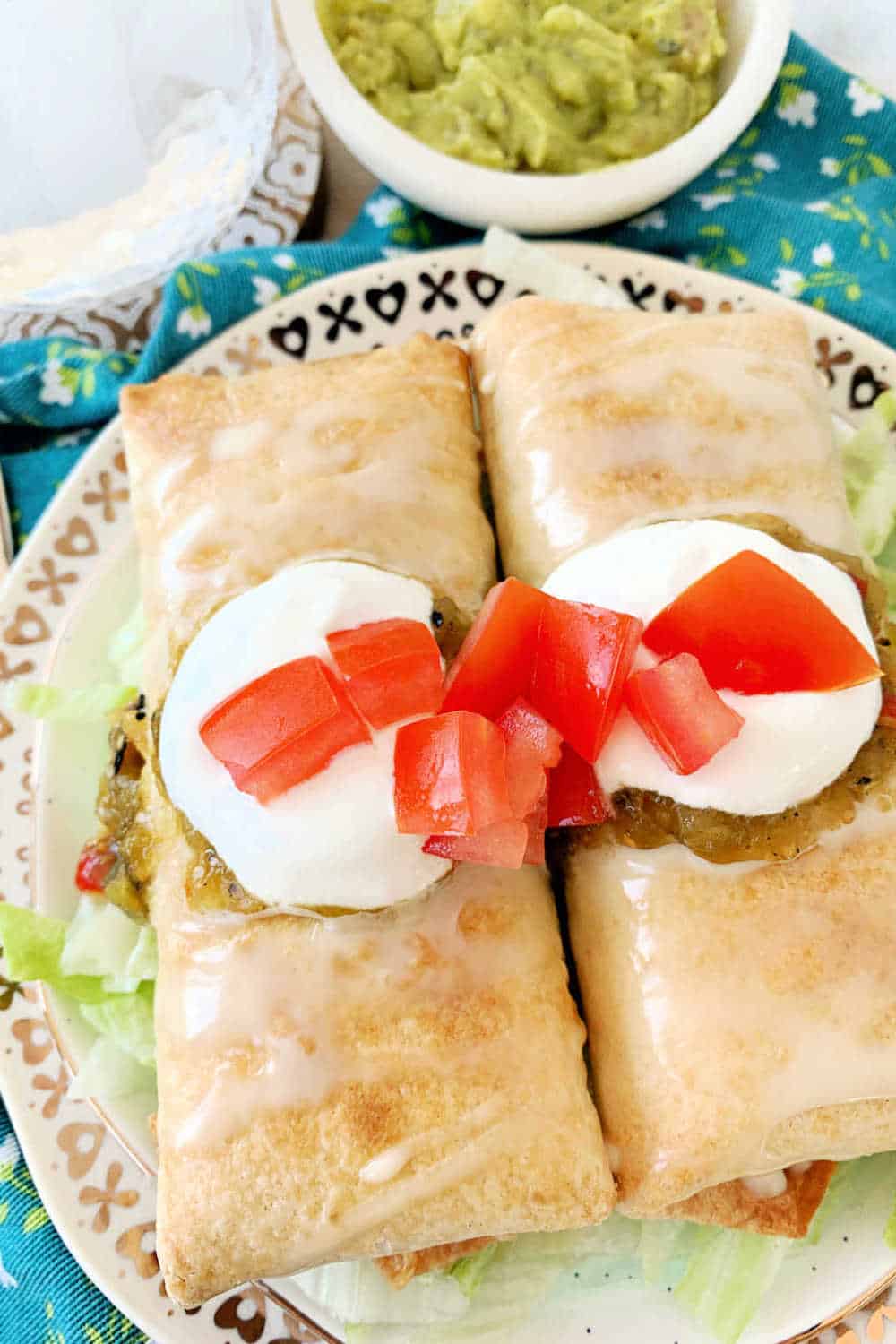 These Air Fryer Chicken Chimichangas taste just like the ones you order from your favorite Mexican restaurant. via @foodtasticmom