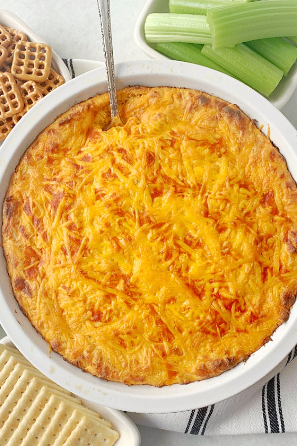 best buffalo chicken dip in dish with dippers