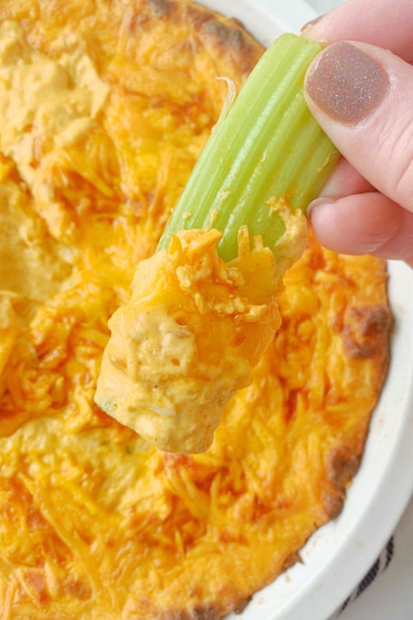 celery dipped in buffalo chicken dip