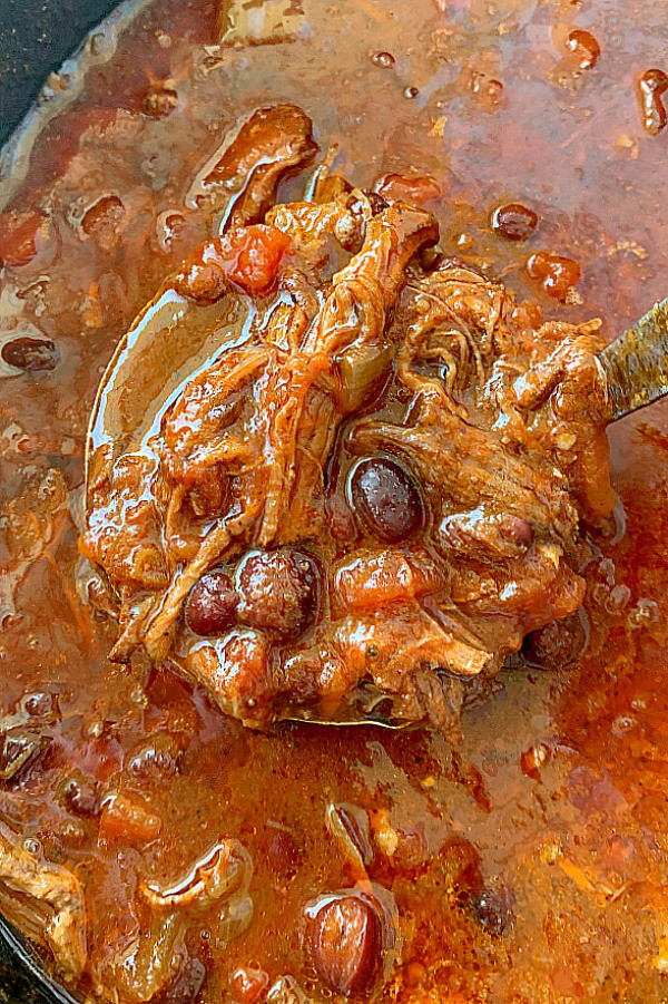 ladeling chili out of crockpot