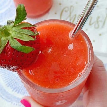 The best strawberry daiquiri is made with simple ingredients - frozen berries, the best rum, strawberry jam, powdered sugar and cardamom.