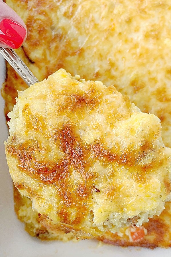 spoonful of loaded grits breakfast casserole