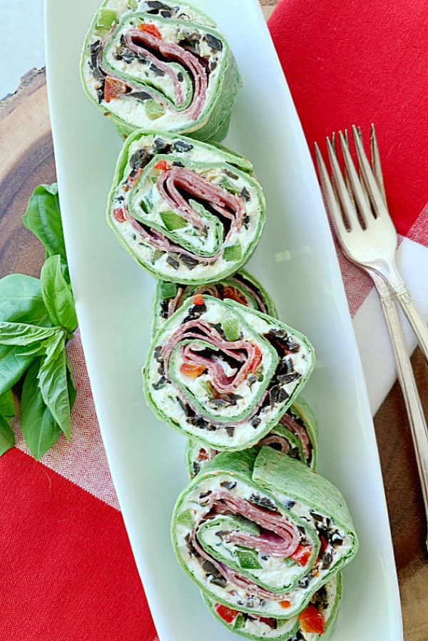 platter of italian pinwheel sandwiches