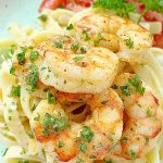 shrimp on plate with fettuccine alfredo