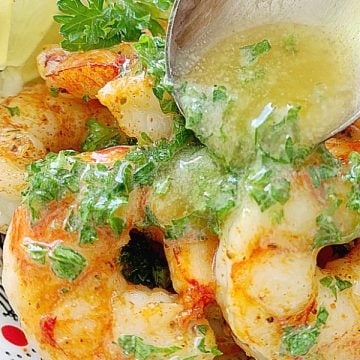 pouring butter over shrimp