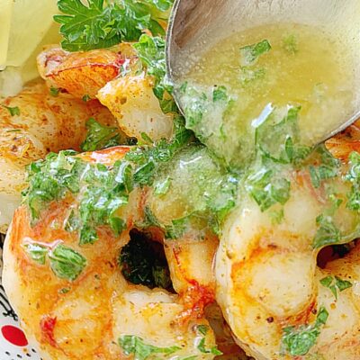 pouring butter over shrimp