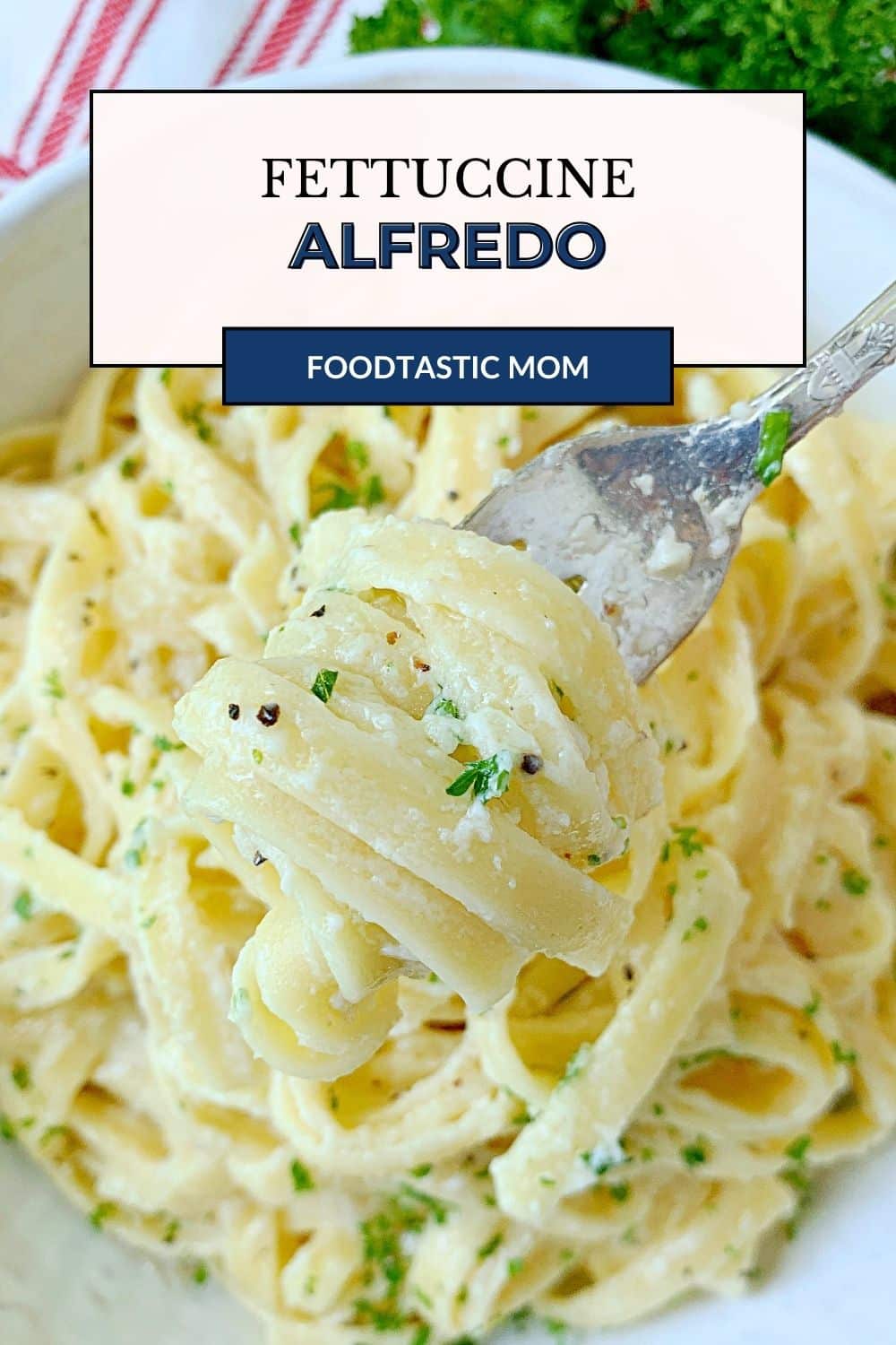 Fettuccine Alfredo is a classic American pasta dish with just a few simple ingredients. It pairs beautifully with shrimp or chicken and is a favorite with my kids! via @foodtasticmom
