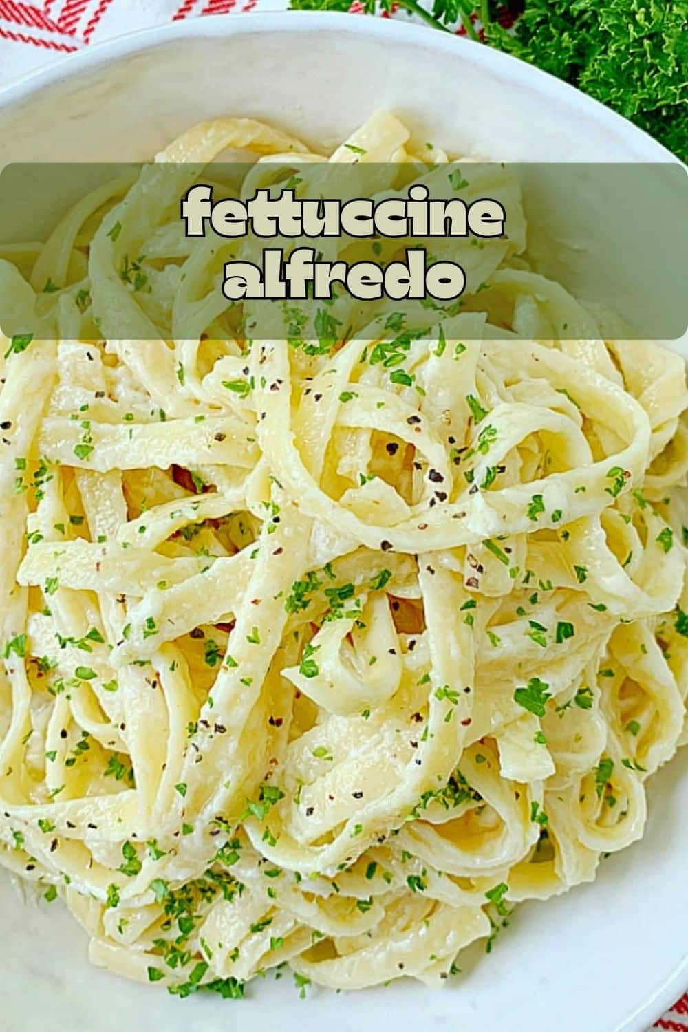 Fettuccine Alfredo is a classic American pasta dish with just a few simple ingredients. It pairs beautifully with shrimp or chicken and is a favorite with my kids! via @foodtasticmom