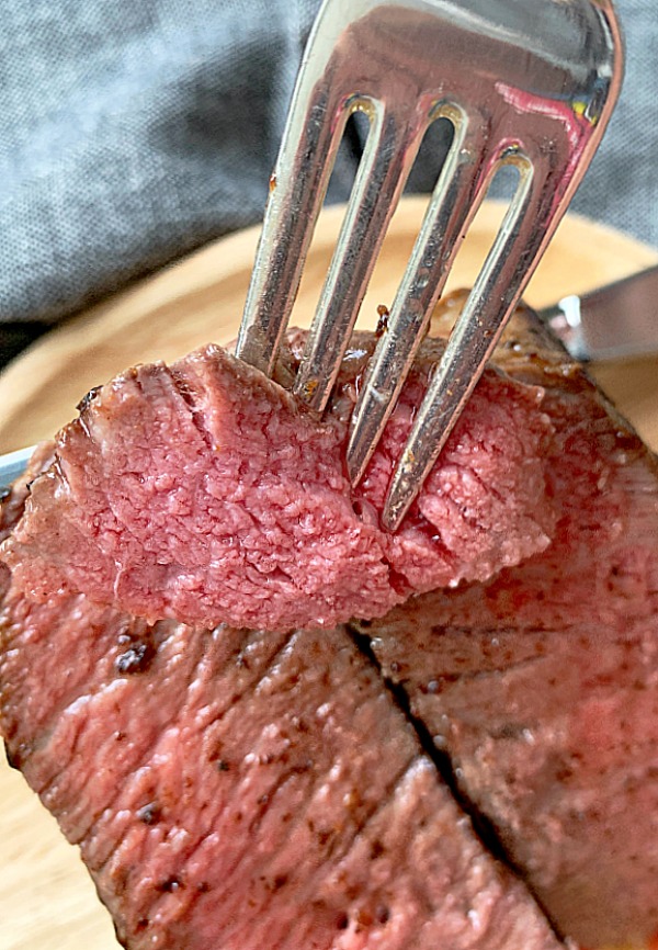 bite of reverse sear steak