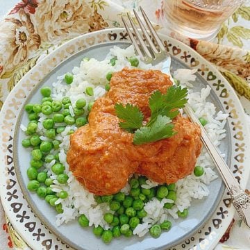 indian butter chicken meatballs on a plate - overhead view