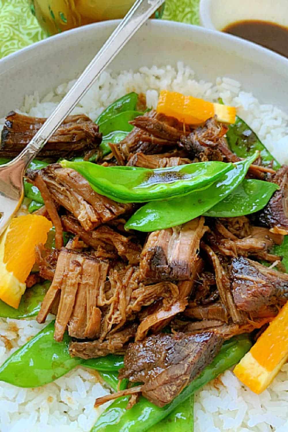 This Crispy Crockpot Orange Beef is the ultimate fake out take out recipe that is full of flavor and simple enough to serve for a busy weeknight dinner. via @foodtasticmom