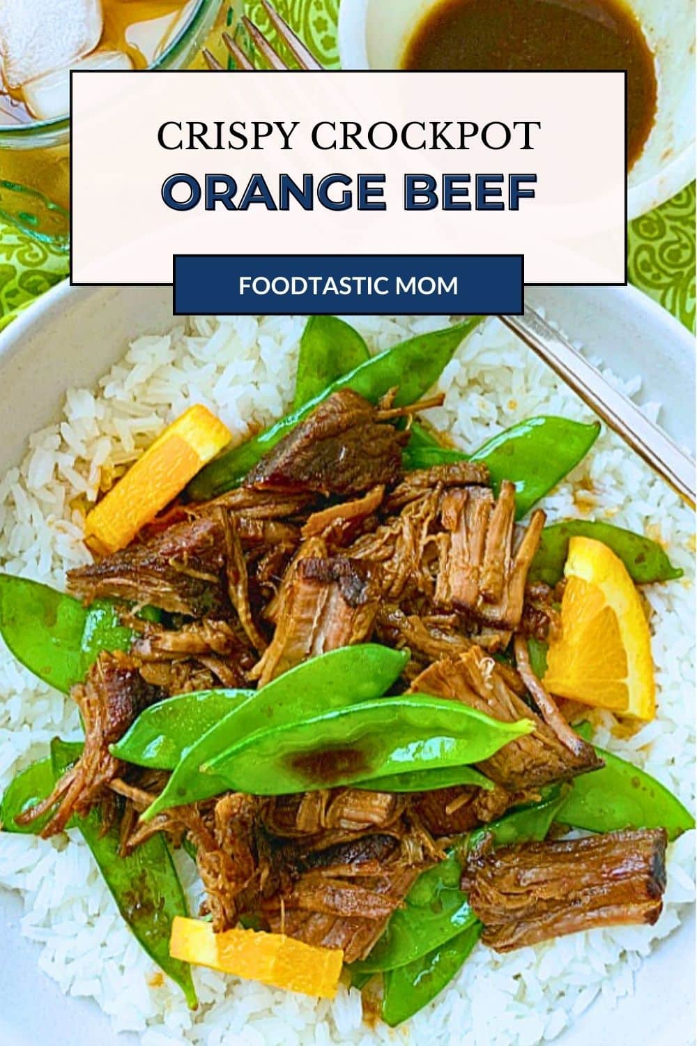 This Crispy Crockpot Orange Beef is the ultimate fake out take out recipe that is full of flavor and simple enough to serve for a busy weeknight dinner. via @foodtasticmom