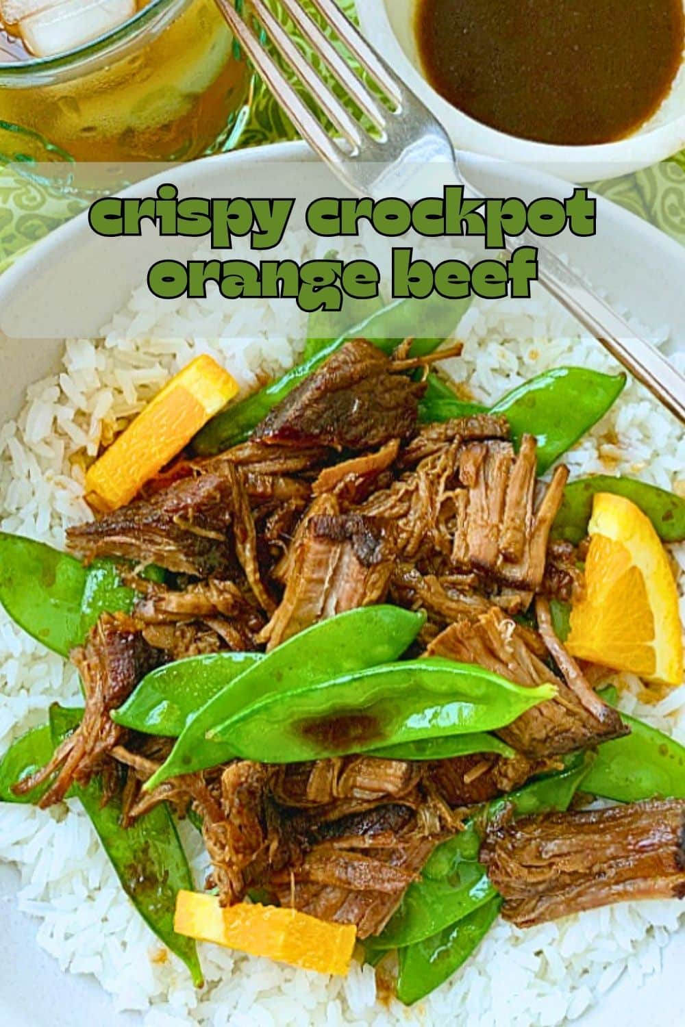 This Crispy Crockpot Orange Beef is the ultimate fake out take out recipe that is full of flavor and simple enough to serve for a busy weeknight dinner. via @foodtasticmom