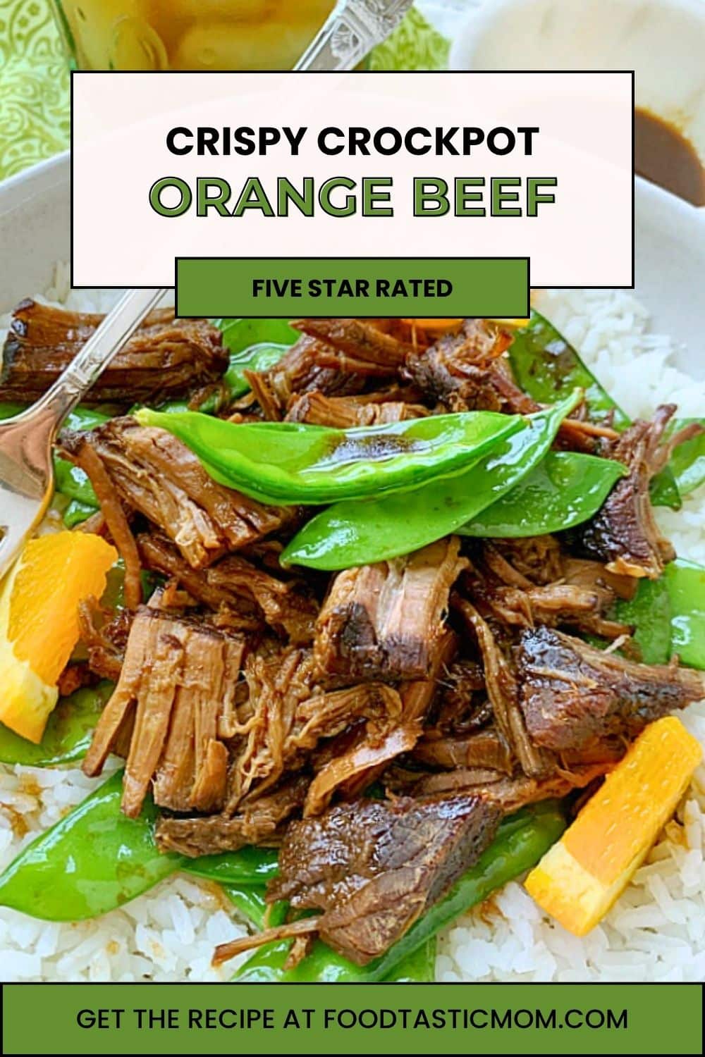 This Crispy Crockpot Orange Beef is the ultimate fake out take out recipe that is full of flavor and simple enough to serve for a busy weeknight dinner. via @foodtasticmom