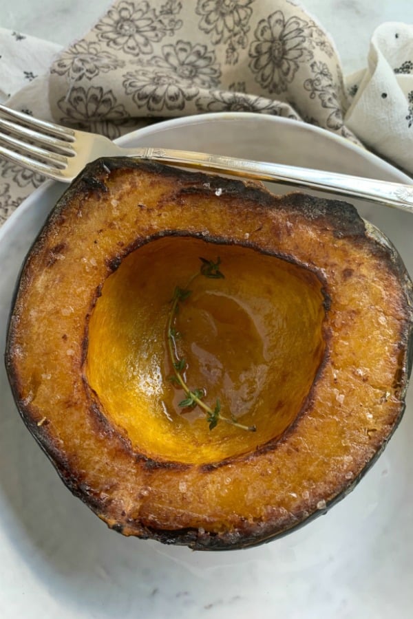 overhead view of air fryer acorn squash