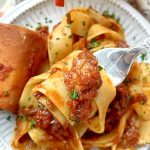 forkful or osso buco ragu with pasta