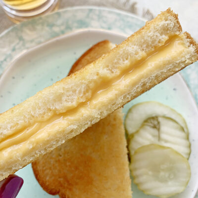 close up of half of grilled cheese