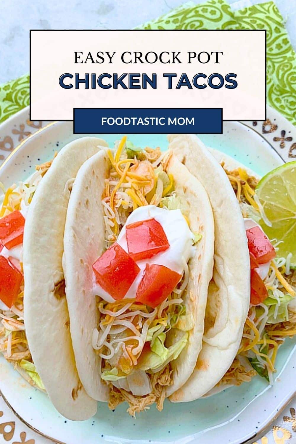 Crockpot Chicken Tacos are always a family-favorite meal. A few surprising ingredients make this shredded chicken taco filling irresistible. via @foodtasticmom