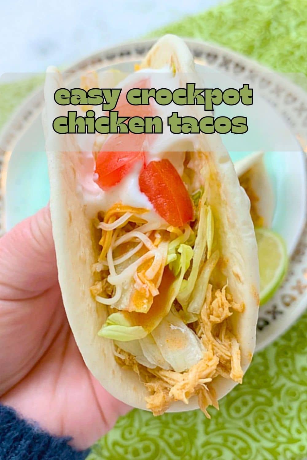 Crockpot Chicken Tacos are always a family-favorite meal. A few surprising ingredients make this shredded chicken taco filling irresistible. via @foodtasticmom