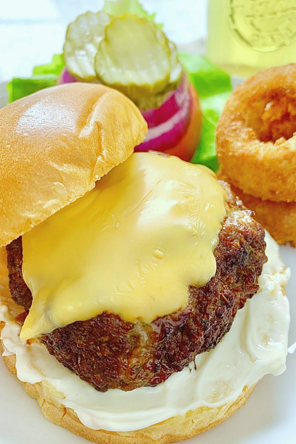 side view of air fryer burgers