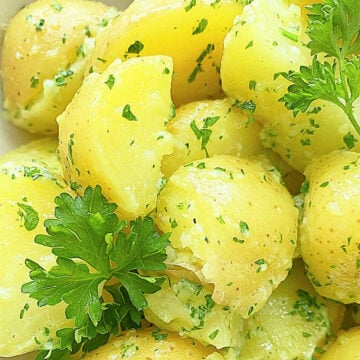 a close-up photo of deliciously yellow parsley potatoes