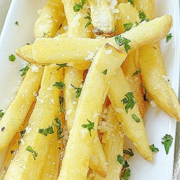 Learn how make Air Fryer Frozen French Fries and then make them extra delicious by turning them into Garlic Parmesan French Fries.