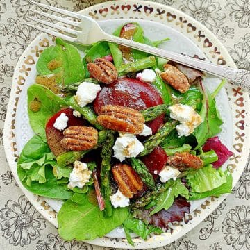 mixed greens topped with asparagus, beets, goat cheese, pecans and a shortcut French vinaigrette