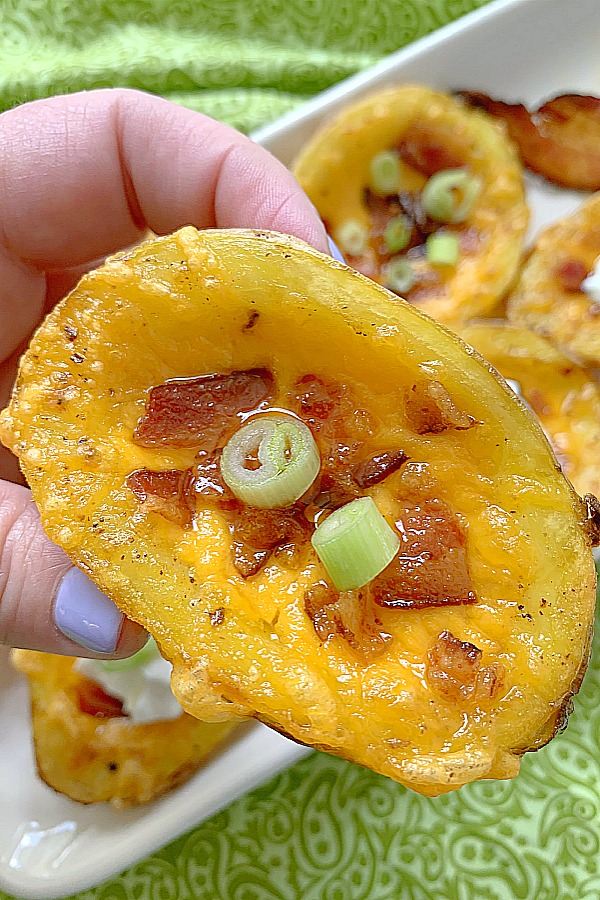 holding an air fryer potato skin in my hand